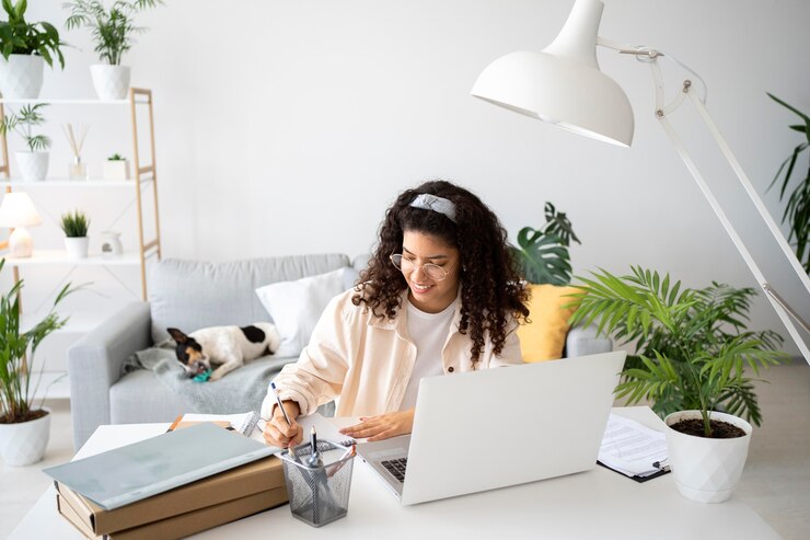 medium shot woman working remote with laptop 23 2149047433